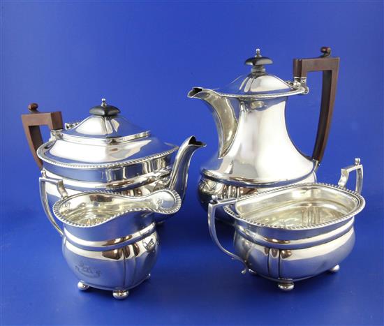 A George V silver four piece tea set, gross 55 oz.